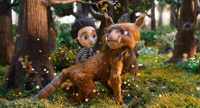 Animated still of a boy with a magical beast