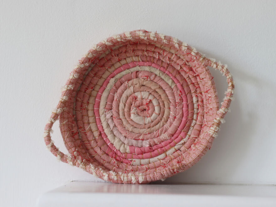 Fabric basket made from pink and white fabric