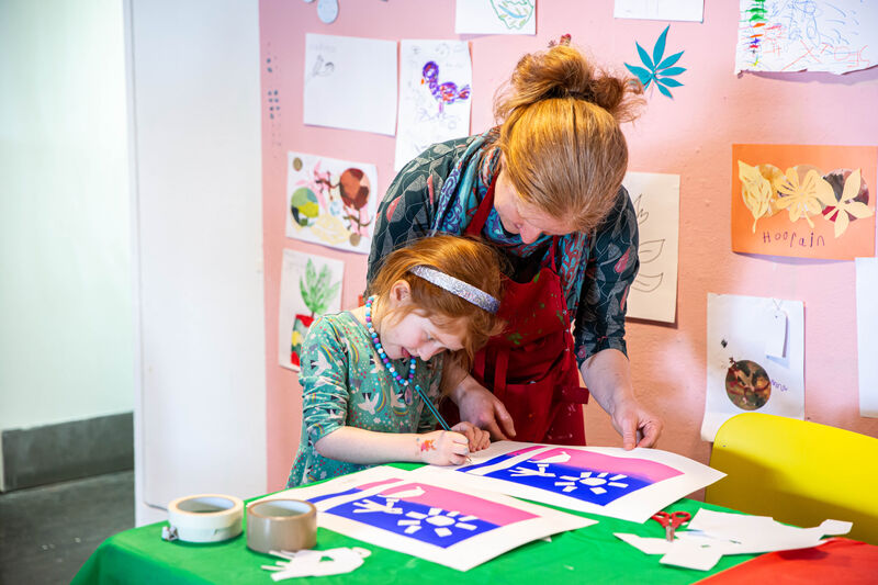 A child works on crafts in our Create Space.