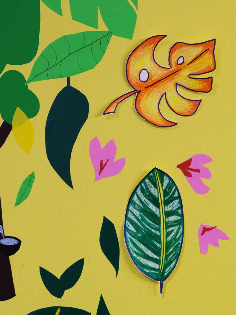 Paper leaves coloured in with coloured pencils
