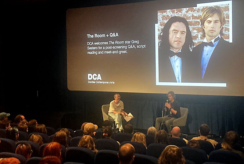 Greg Sestero on stage at DCA