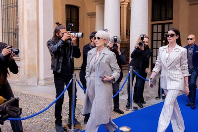 Meryl Streep and Anne Hathaway on a photo walk wearing sunglasses