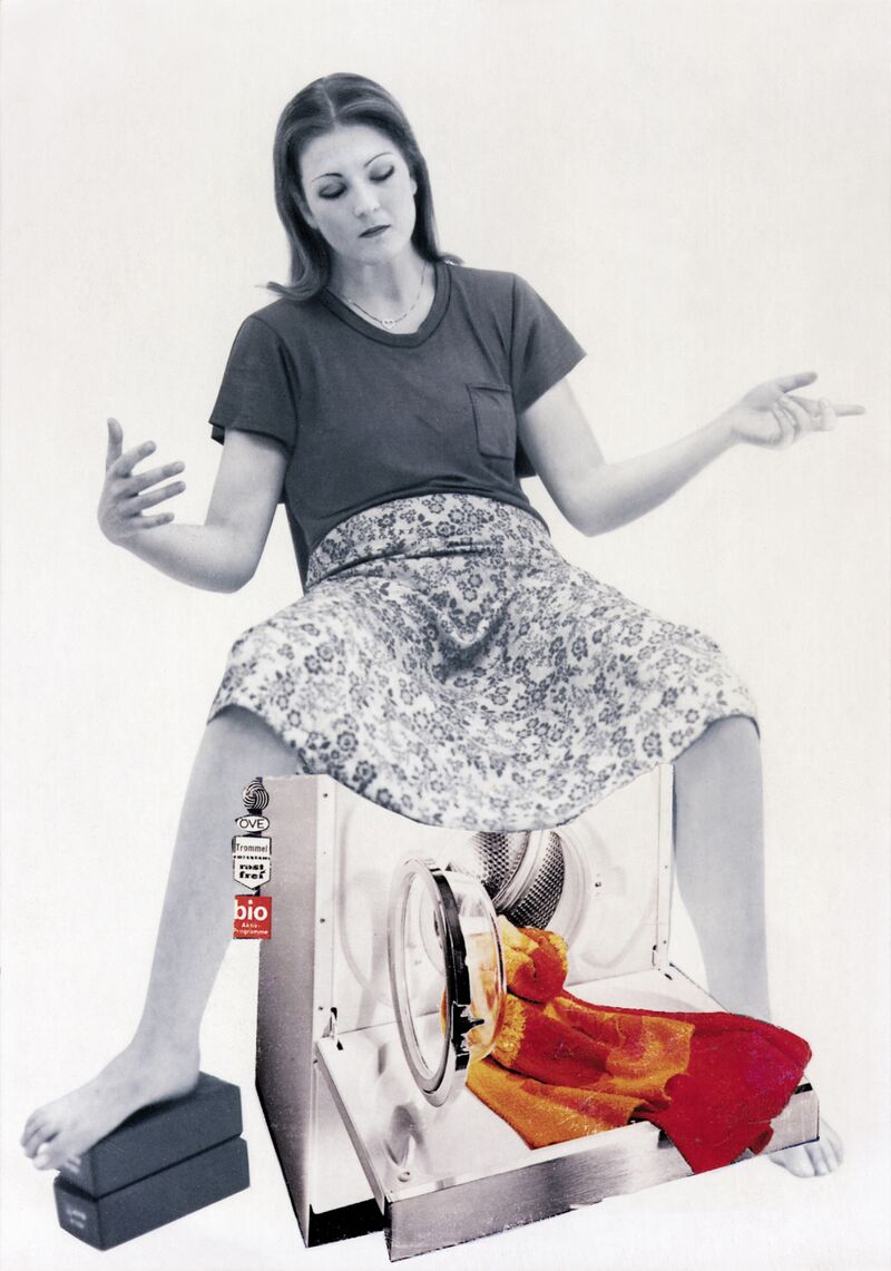 Black and white image, sitting on a washing machine 
