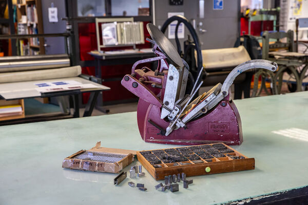 Table top Adana Letterpress machine with draw of metal type