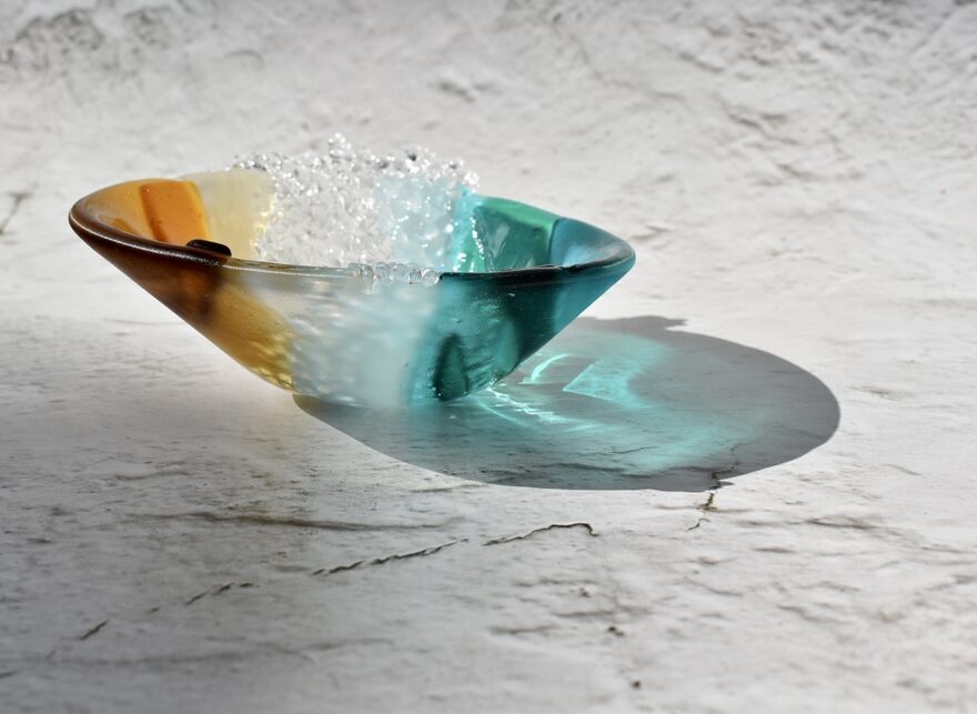 Glass bowls with ornage, blue and clear glass