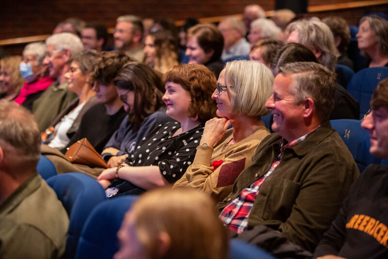 Cinema audience smiling at a Q and A