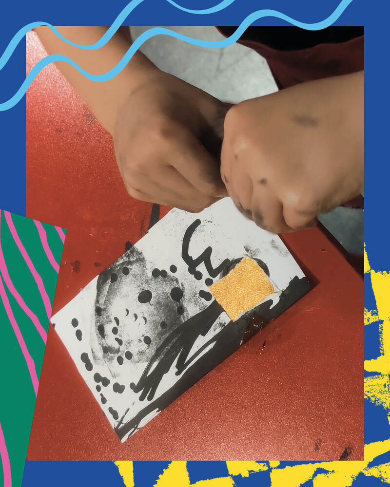 Child making an artwork