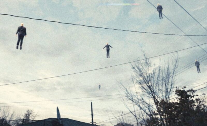 Figures floating in the sky