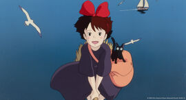 A young girl and a scared cat fly above the ocean on a broomstick