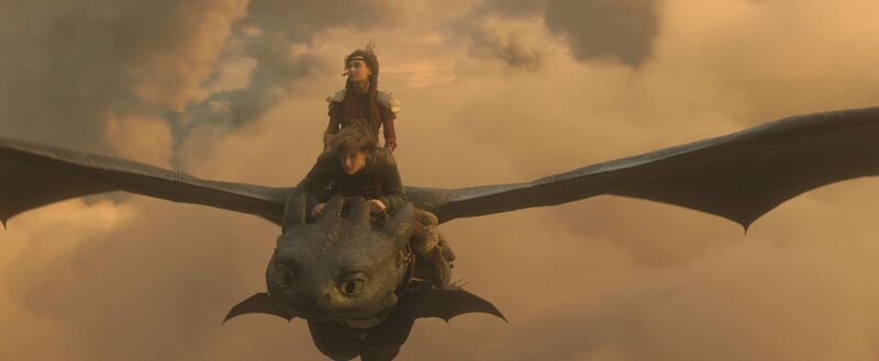 Two people ride on the back of a dragon and fly through the skies.