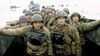 Troops arrive on a boat in Saving Private Ryan