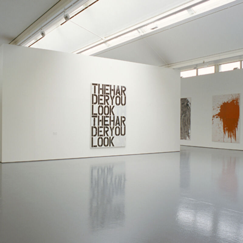 From Christopher Wool's exhibition at DCA. A large canvas has the phrase 'The Harder You Look The Harder You Look' written on it capitals.