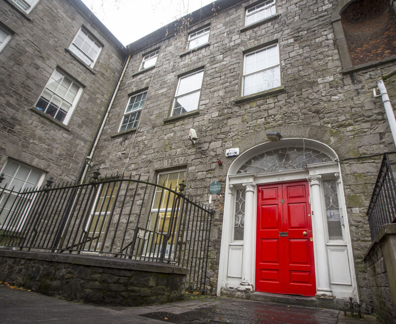 Studio exterior of Limerick Printmakers with red door