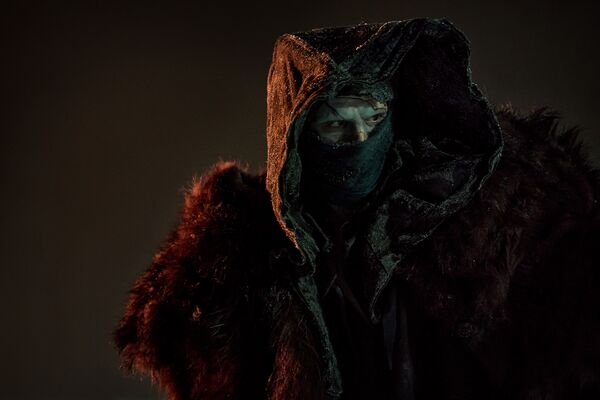 The cloaked figure of Frankenstein's monster.