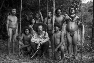 A black and white image of amazon tribes people 