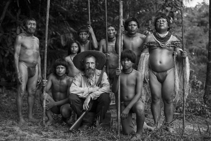 A black and white image of amazon tribes people 
