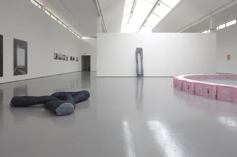 DCA Galleries during Infinite Jest. A large soft, blue fabric sculpture lies on the floor.