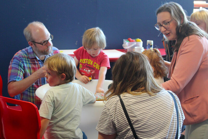 Paren ts and children playing in Create Space