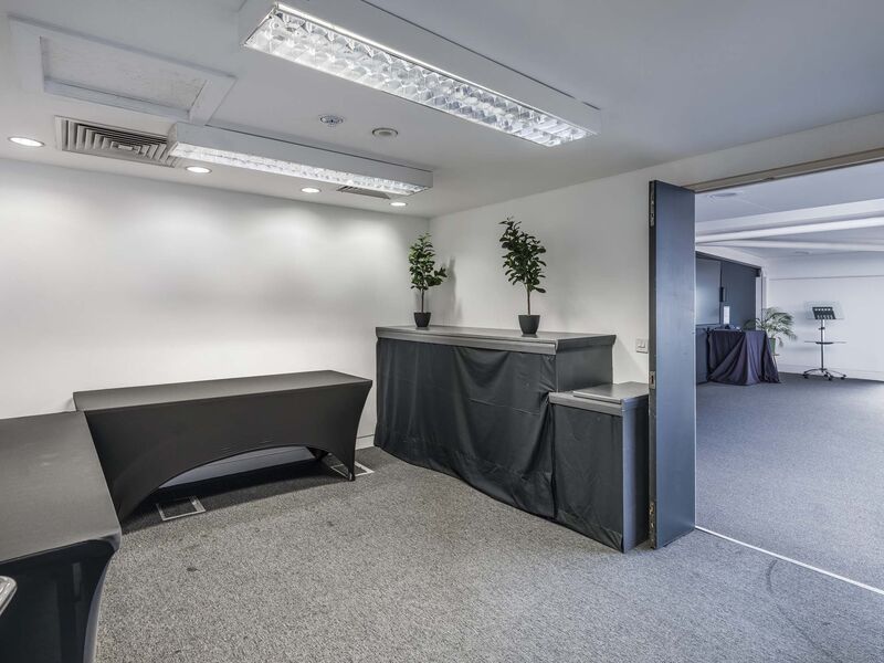a small side room off the side of a large meeting room