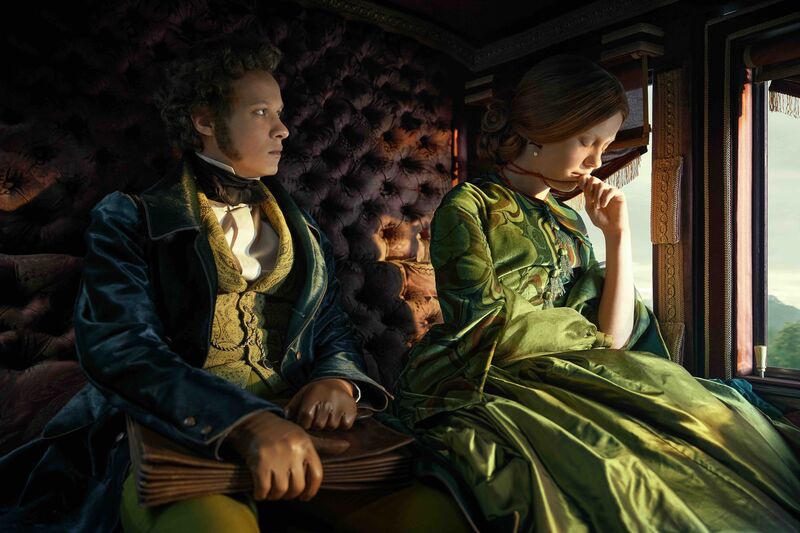 A man in fine regency clothing sits in a carriage looking at a woman in a big green dress.