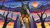 Illustrated figure with animal head in front of a background of trees and a moon in the sky