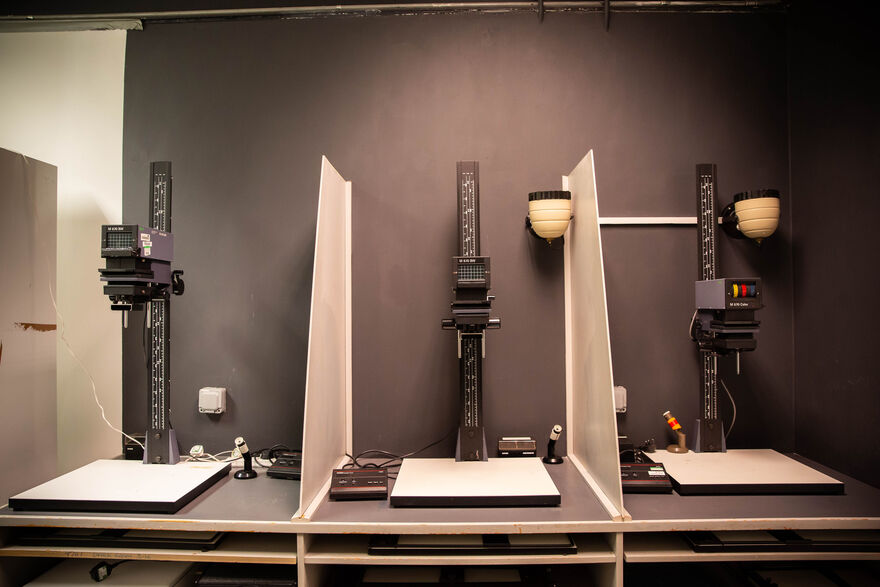 Photo enlargers in the darkroom at DCA Print Studio