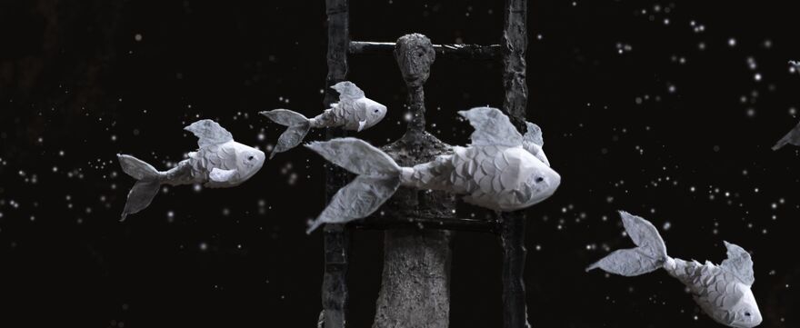 Animated still of fish swimming past a human character