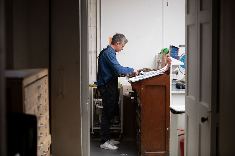 Person printing in Limerick Printmakers