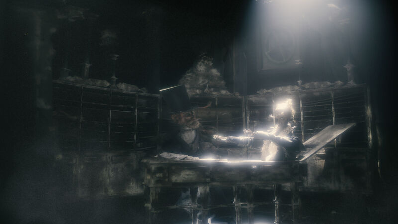 Puppet rising from a coffin while another watches