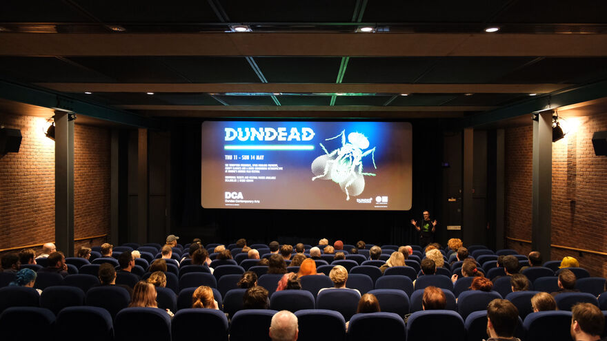 Dundead programmer introduces a Dundead screening to an audience in DCA Cinema 1
