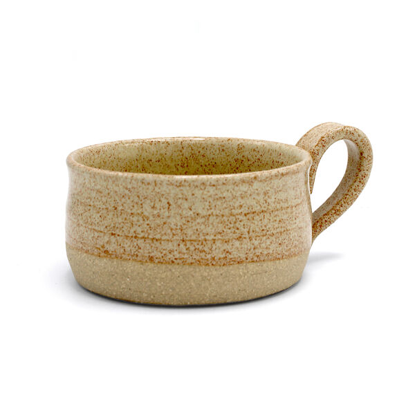 Short, wide stoneware mug with speckle pattern