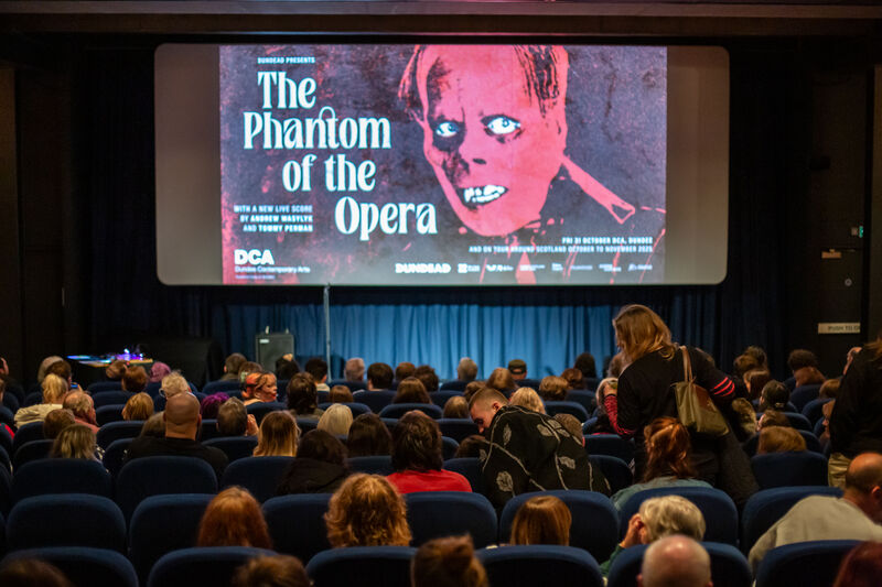 Audience arriving in DCA Cinema 1 for The Phantom of the Opera