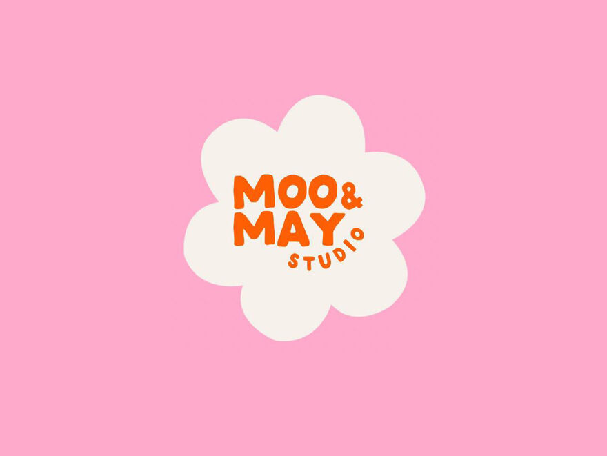 Flower shape with orange Moo & May Studio text in the middle