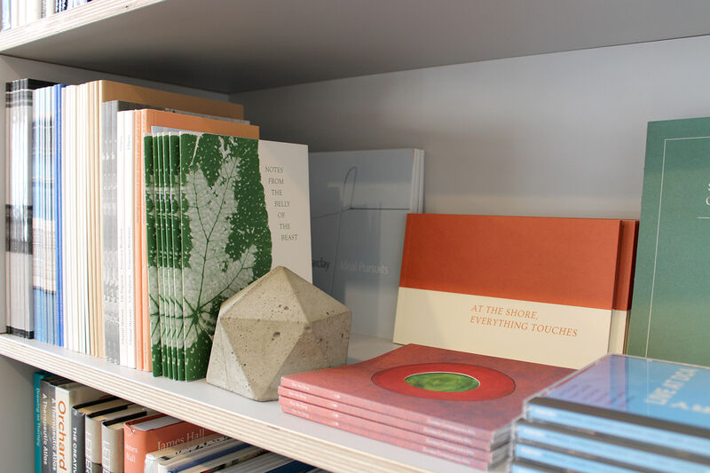 Collection of DCA publications on the shelf in DCA Shop