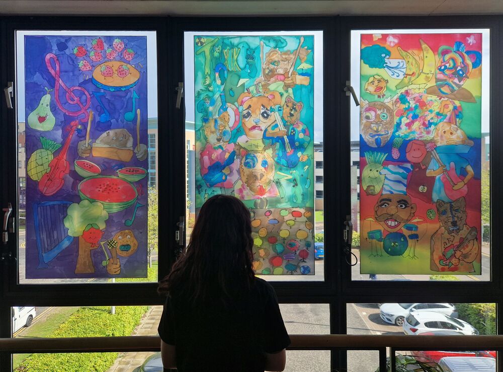 Windows of Create Space with vinyl artwork