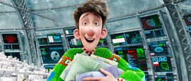 Still of Arthur Christmas holding an arm full of letters
