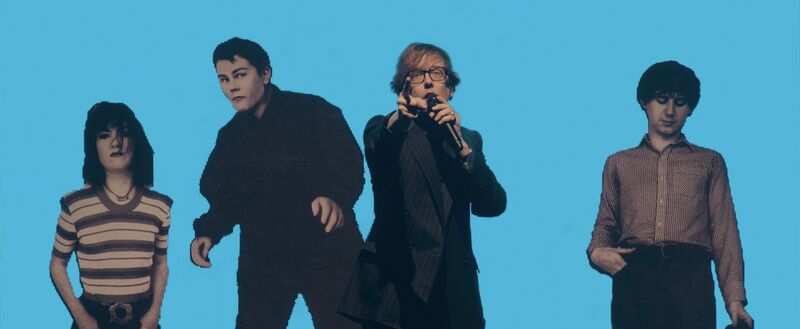 Jarvis Cocker performing on stage