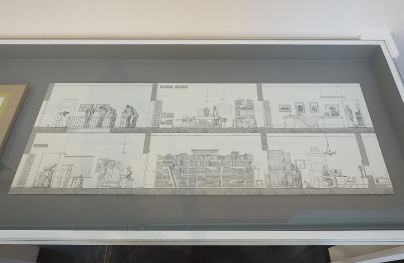 A hand-drawn pencil image from IC-98's exhibition, which is displayed in a glass table. The picture shows several rooms in a house, with people living in the rooms.