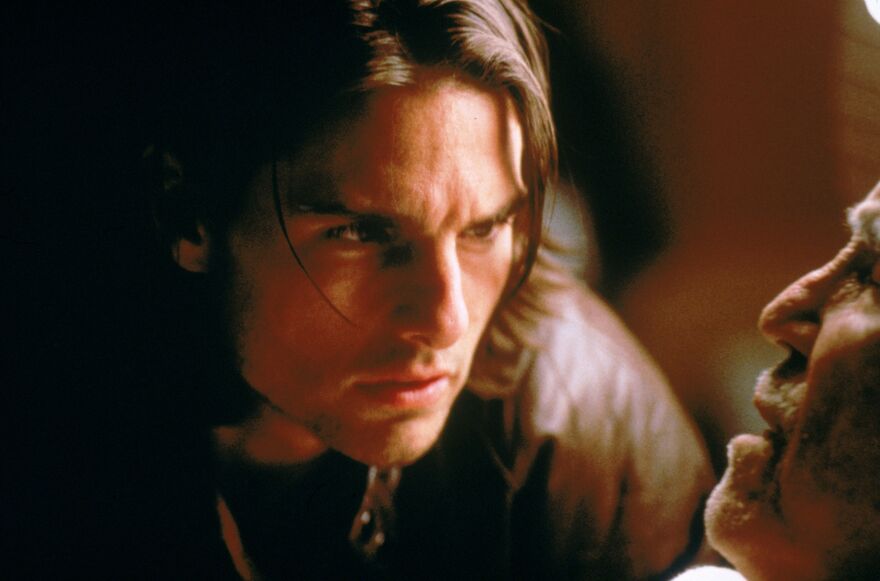 Tom Cruise with long hair in a scene from Magnolia