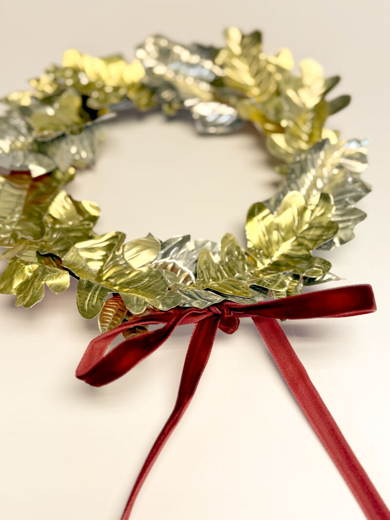 Foil wreath with red ribbon