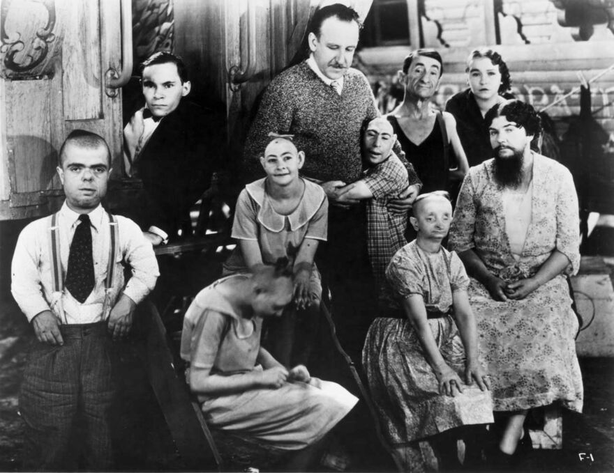 A black and white photo of the cast of Tod Browning's Freaks