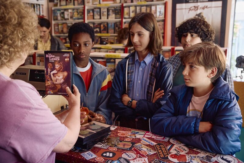A group of school boys try to purchase an adult video