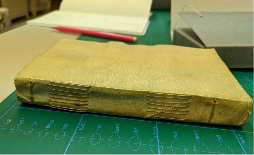 Handmade book on a cutting mat