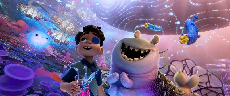 A little boy and a worm-like space alien float through a colourful galaxy together.