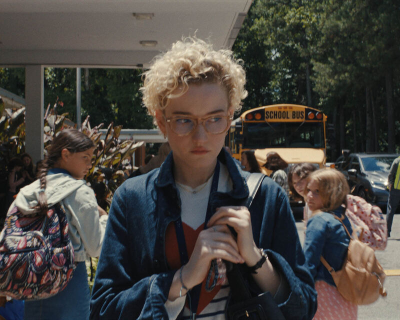Woman walking outside a school