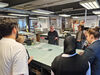 Pupils from Morgan Academy in DCA Print Studio getting instructions from tutor Bruce Shaw