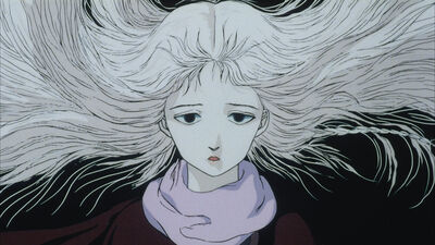Anime still of a girl with long white hair and lilac scarf