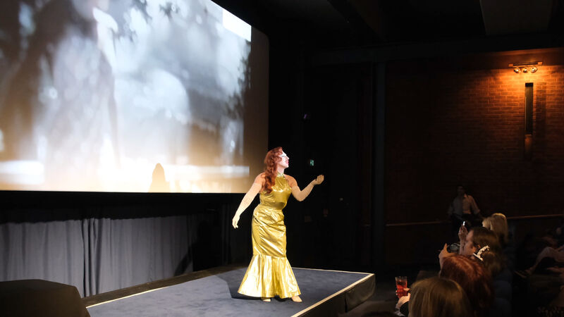 St Salvatore performing on the stage at Dundead Halloween's screening of The Rocky Horror Picture Show