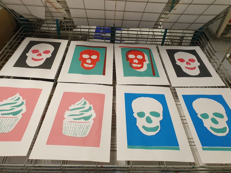 Screen prints of cupcakes and skulls