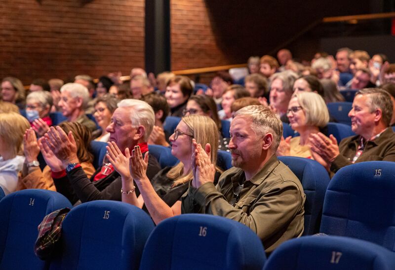 Audience applauding in a cinema at DCA
